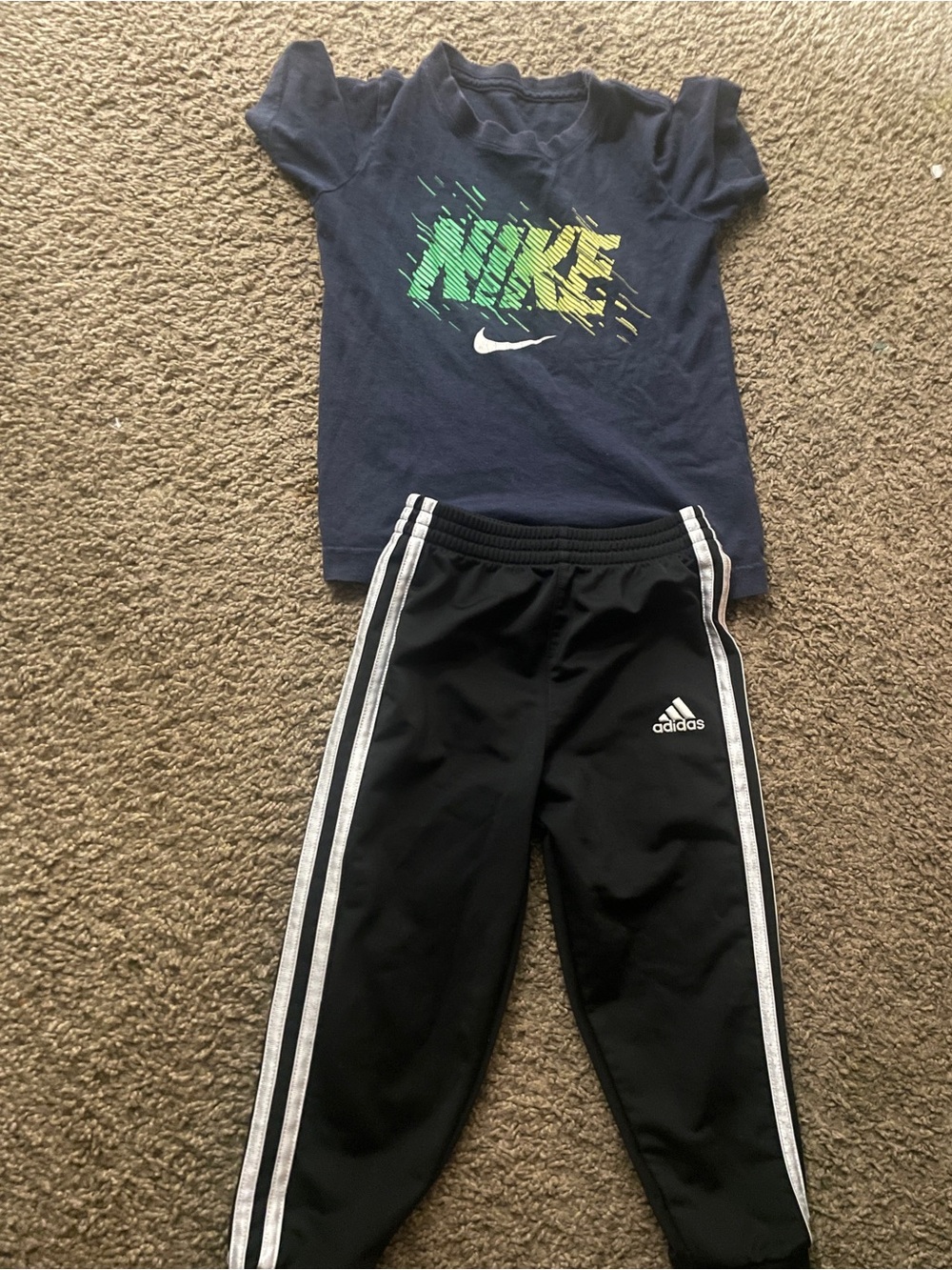 2 for $7 . Adidas Kids Black Joggers with White Side Stripes& Nike top